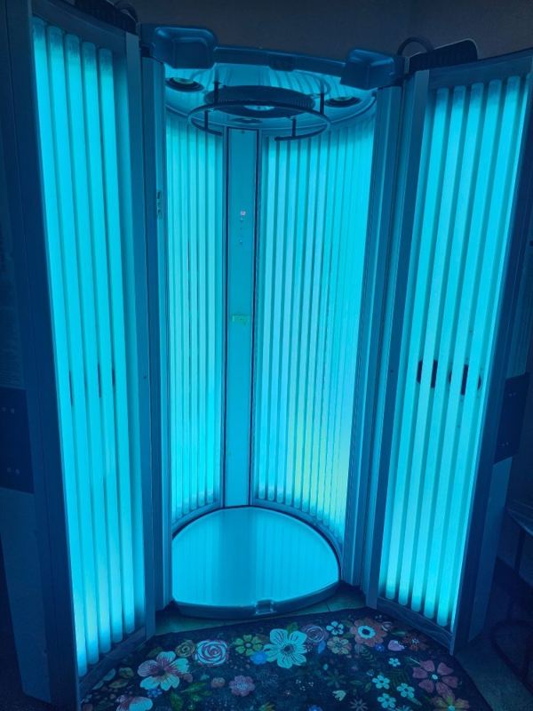 Stand-up tanning booth at Main Street Studio