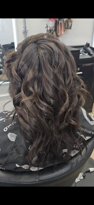 Curled brunette style